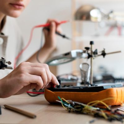 young-female-inventor-creating-her-workshop_23-2149067224 young-female-inventor-creating-her-workshop_23-2149067224